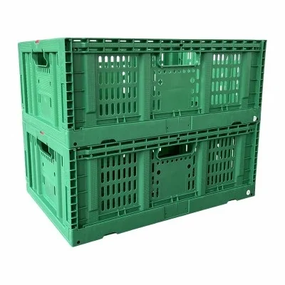 Green collapsible plastic crates used for produce storage and logistics