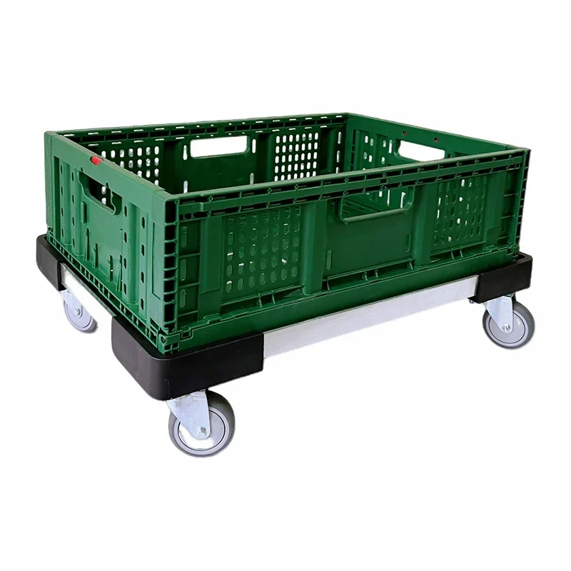 Green collapsible plastic crate seated on a compatible crate dolly