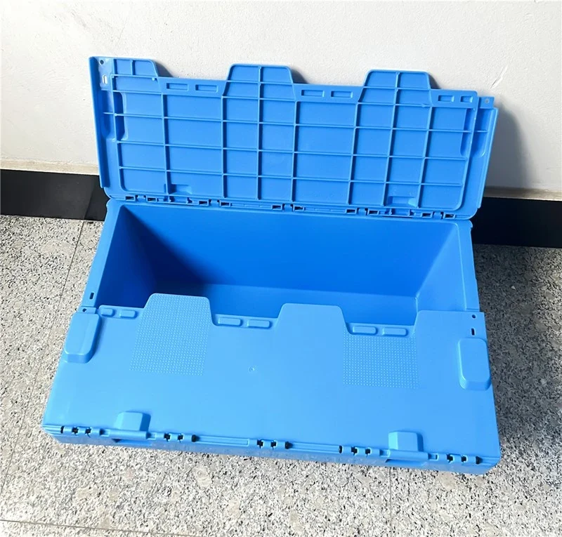 Blue attached lid container with both interlocking lid sections open.