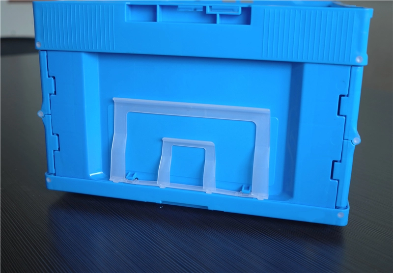 Side panel and locking structure of a blue collapsible plastic crate